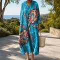 Figurschmeichelndes Frühlingskleid mit Print Damen – Weiss Modehaus